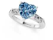 Fancy Blue Heart Cut Diamond Solitaire Ring Set in Silver with Tapered Baguette Side Stones and Prong Setting