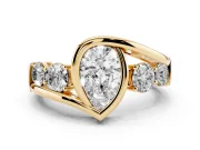 Pear Cut Diamond Bezel Bypass Ring Set in Yellow gold with Round Accents