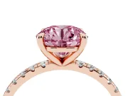 Fancy Pink Round Cut Diamond Brilliant Solitaire Ring Set in Rose gold with Pavé Band and Prong Setting