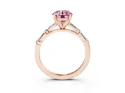 Fancy Pink Round Cut Diamond Solitaire Set in Rose gold with Side Baguettes and Channel Set Band