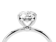Oval Cut Diamond Solitaire Engagement Ring Set in Silver with Thin Band and Prong Setting