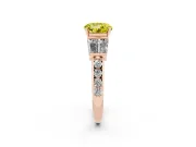 Fancy Yellow Round Cut Diamond Engagement Ring Set in Rose gold with Baguette Side Stones and Channel Set Band