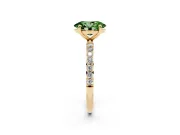 Fancy Green Oval Cut Diamond Solitaire Ring Set in Yellow gold with Round Pavé Band and Prong Setting