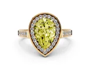 Fancy Yellow Pear Cut Diamond Halo Solitaire Ring Set in Yellow gold with Pavé Band and Bezel Setting