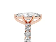 Marquise Cut Diamond Solitaire Ring Set in Rose gold with Shared Prong Pavé Band