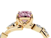 Fancy Pink Emerald Cut Diamond Solitaire Ring Set in Yellow gold with Twisted Marquise Accent Band
