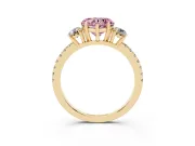 Fancy Pink Heart Cut Diamond Three-Stone Ring Set in Yellow gold with Pavé Band and Graduated Sides