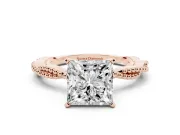 Princess Cut Diamond Solitaire Ring Set in Rose gold with Twisted Band and Bead Prong Setting