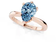 Fancy Blue Pear Cut Diamond Solitaire Engagement Ring Set in Rose gold with Slim Tapered Solitaire Band