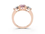 Fancy Pink Oval Cut Diamond Three-Stone Ring Set in Rose gold with Prong Setting and Classic Band