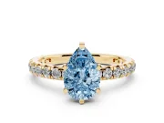 Fancy Blue Pear Cut Diamond Pavé Solitaire Ring Set in Yellow gold with Round Band and Prong Setting