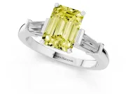 Fancy Yellow Emerald Cut Diamond Solitaire Ring Set in Silver with Tapered Baguette Accents and Prong Setting