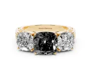 Fancy Black Cushion Cut Diamond Three-Stone Ring Set in Yellow gold with Textured Band
