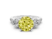 Fancy Yellow Three-Stone Round Cut Diamond Pavé Band Ring Set in White gold with Prong-Set Trio