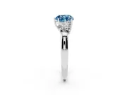 Fancy Blue Heart Cut Diamond Three-Stone Ring Set in Platinum with Bold Center and Classic Band