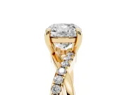 Cushion Cut Diamond Twist Band Solitaire Set in Yellow gold with Pavé Accents and Prong Setting