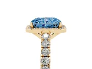 Fancy Blue Radiant Cut Diamond Halo Engagement Ring Set in Yellow gold with Pavé Band and Prong Setting