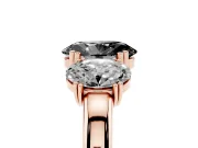 Fancy Black Oval Cut Diamond Three-Stone Ring Set in Rose gold with Polished Band and Prong Setting