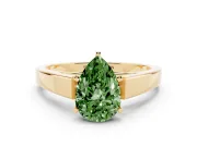 Fancy Green Pear Cut Diamond Solitaire Engagement Ring Set in Yellow gold with Prong Setting and Tapered Band