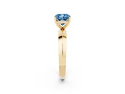 Fancy Blue Cushion Cut Diamond Solitaire Engagement Ring Set in Yellow gold with Flat Band and Prong Setting