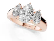 Three-Stone Pear Cut Diamond Ring Set in Rose gold with Matching Prong Settings and Plain Band