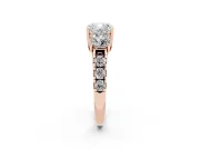 Cushion Cut Diamond Three-Stone Ring Set in Rose gold with Pavé Band