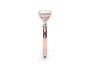 Princess Cut Diamond Solitaire Ring Set in Rose gold with Tapered Baguette Side Stones and Prong Setting