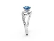 Fancy Blue Round Cut Diamond Solitaire Ring Set in White gold with Pavé Twist Band and Secure Prong Setting