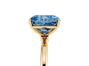 Fancy Blue Radiant Cut Diamond Solitaire Engagement Ring Set in Yellow gold with Thin Band and Prong Setting