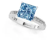 Fancy Blue Princess Cut Diamond Solitaire Ring Set in Platinum with Slim Pavé Band and Prong Setting
