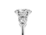 Three-Stone Oval Cut Diamond Ring Set in Silver with Pear Side Stones and Prong Setting