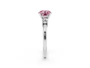 Fancy Pink Three-Stone Round Cut Diamond Ring Set in White gold with Prong Setting and Plain Band