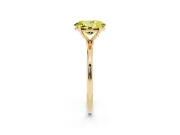 Fancy Yellow Oval Cut Diamond Solitaire Engagement Ring Set in Yellow gold with Thin Band and Prong Setting
