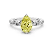 Fancy Yellow Pear Cut Diamond Pavé Solitaire Ring Set in White gold with Round Band and Prong Setting
