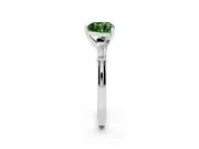 Fancy Green Heart Cut Diamond Solitaire Ring Set in Platinum with Tapered Baguette Side Stones and Prong Setting