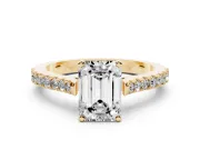 Emerald Cut Diamond Solitaire Engagement Ring Set in Yellow gold with Delicate Pavé Band and Prong Setting