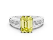 Fancy Yellow Emerald Cut Diamond Solitaire Ring Set in Silver with Channel-Set Band and Prong Setting