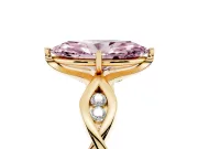 Fancy Pink Marquise Cut Diamond Twist Band Solitaire Ring Set in Yellow gold with Leaf Prong Setting and Accent Stones