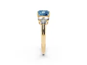 Fancy Blue Princess Cut Diamond Cluster Ring Set in Yellow gold with Round Accent Stones and Prong Setting on a Plain Band
