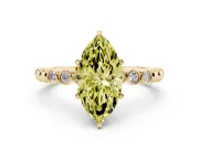 Fancy Yellow Marquise Cut Diamond Solitaire Engagement Ring Set in Yellow gold with Bezel Accents on Beaded Band