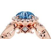 Fancy Blue Round Cut Diamond Halo Ring Set in Rose gold with Milgrain Pavé Band and Prong Setting