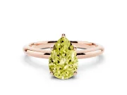 Fancy Yellow Pear Cut Diamond Solitaire Engagement Ring Set in Rose gold with Prong Setting and Polished Band