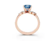 Fancy Blue Princess Cut Diamond Solitaire Ring Set in Rose gold with Marquise Twist Band and Prong Setting