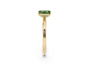 Fancy Green Emerald Cut Diamond Solitaire Ring Set in Yellow gold with Prong Setting on a Polished Plain Band