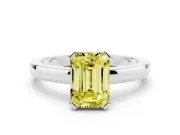 Fancy Yellow Emerald Cut Diamond Solitaire Ring Set in White gold with Prong Head and Smooth Polished Band