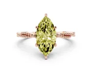 Fancy Yellow Marquise Cut Diamond Solitaire Ring Set in Rose gold with Twisted Band and Bead Prong Setting
