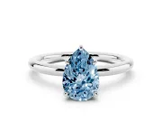 Fancy Blue Pear Cut Diamond Solitaire Ring Set in Silver with Thin Band and Prong Setting