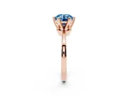 Fancy Blue Round Cut Diamond Solitaire Engagement Ring Set in Rose gold with Slim Tapered Solitaire Band