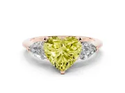 Fancy Yellow Three-Stone Heart Cut Diamond Ring Set in Rose gold with Pear Side Stones and Prong Setting