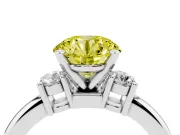 Fancy Yellow Three-Stone Round Cut Diamond Ring Set in Platinum with Prong Setting and Plain Band